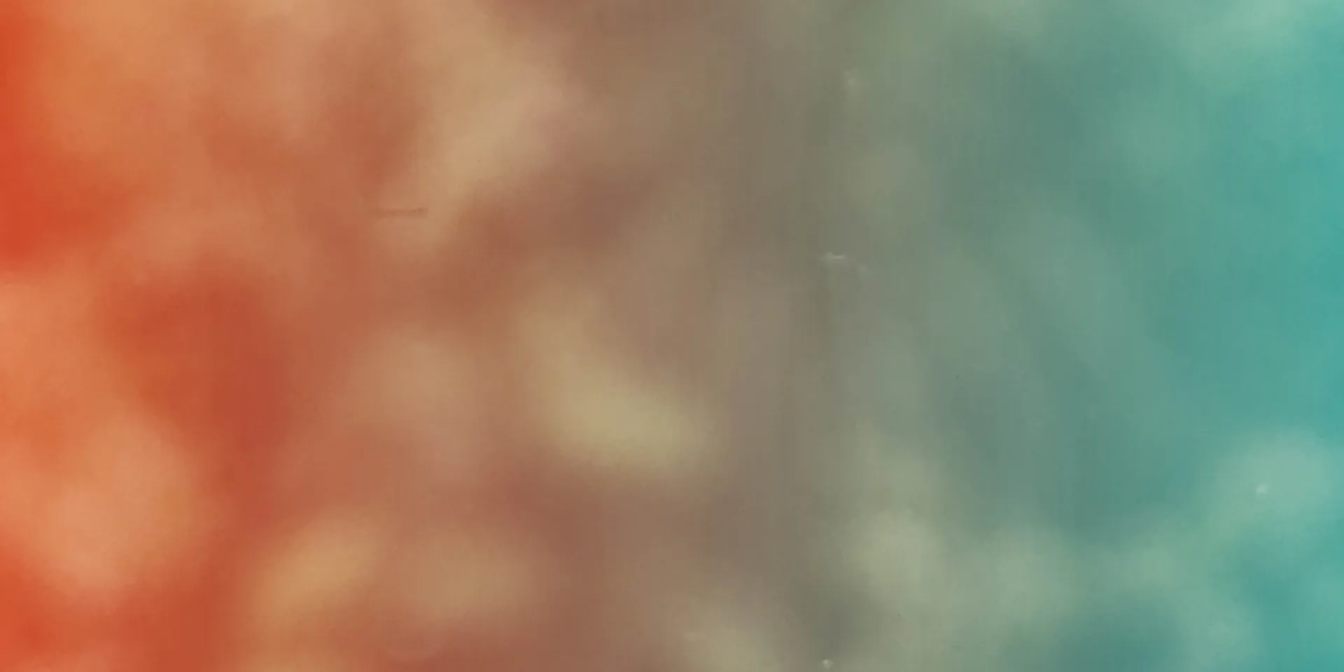 Orange-and-teal abstract background.